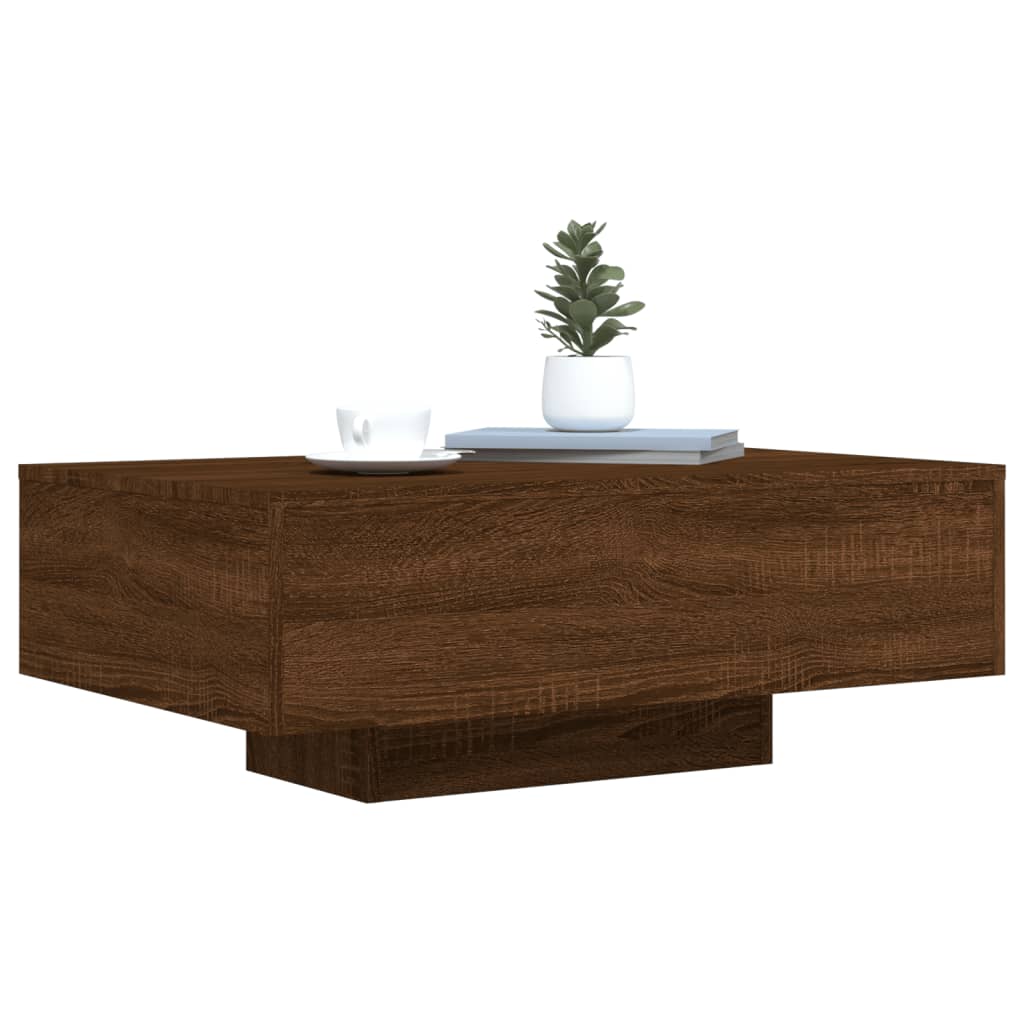 barna tölgyszínű dohányzóasztal LED-lámpákkal 85 x 55 x 31 cm