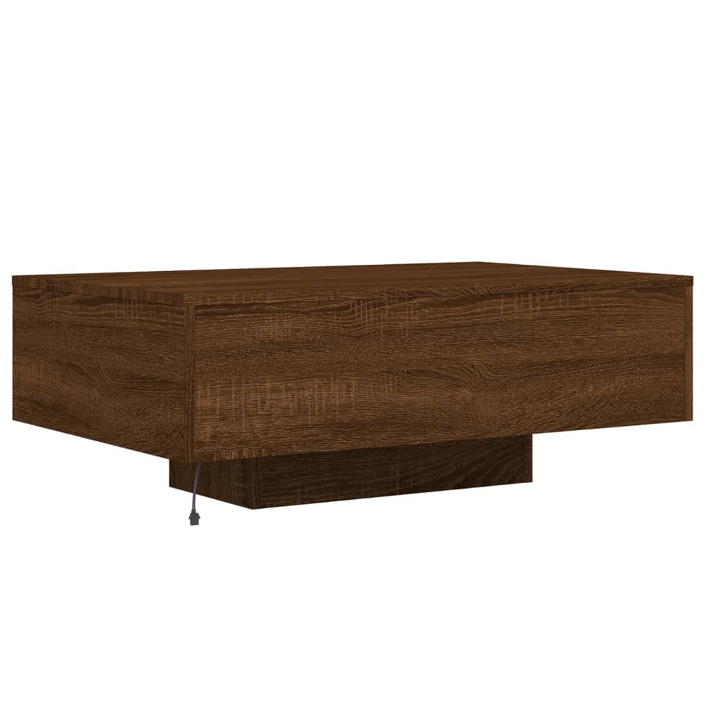 barna tölgyszínű dohányzóasztal LED-lámpákkal 85 x 55 x 31 cm
