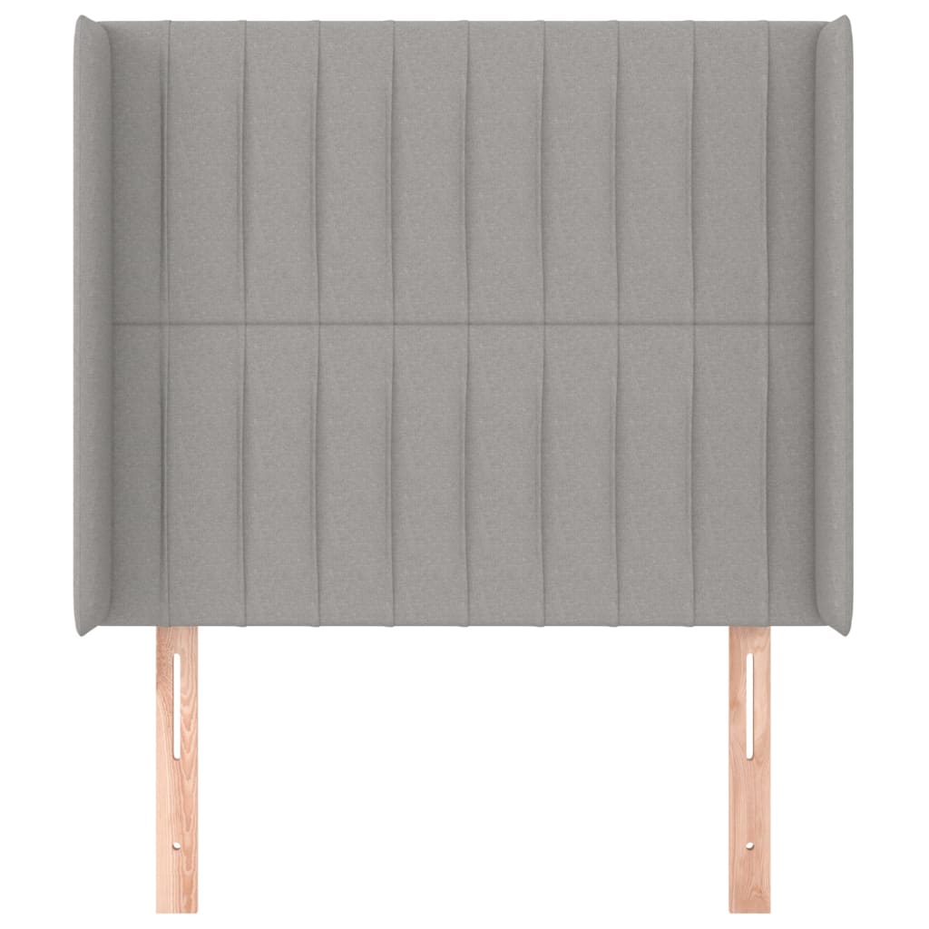 világosszürke szövet fejtámla szárnyakkal 83x16x118/128 cm
